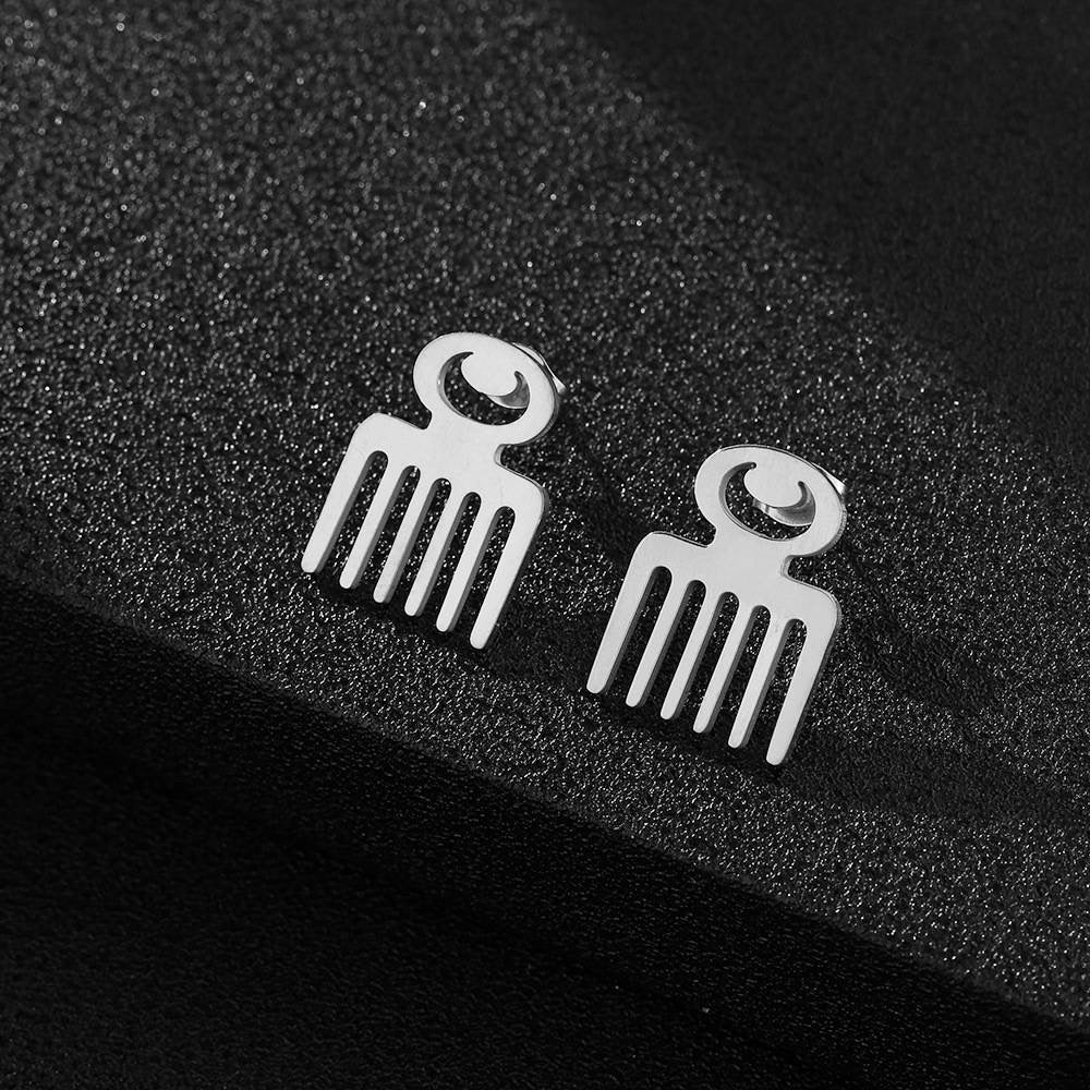 Afro pick (comb) earrings.